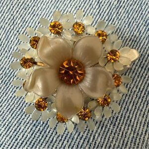 Floral hair clip with citrine faux gemstone accents.